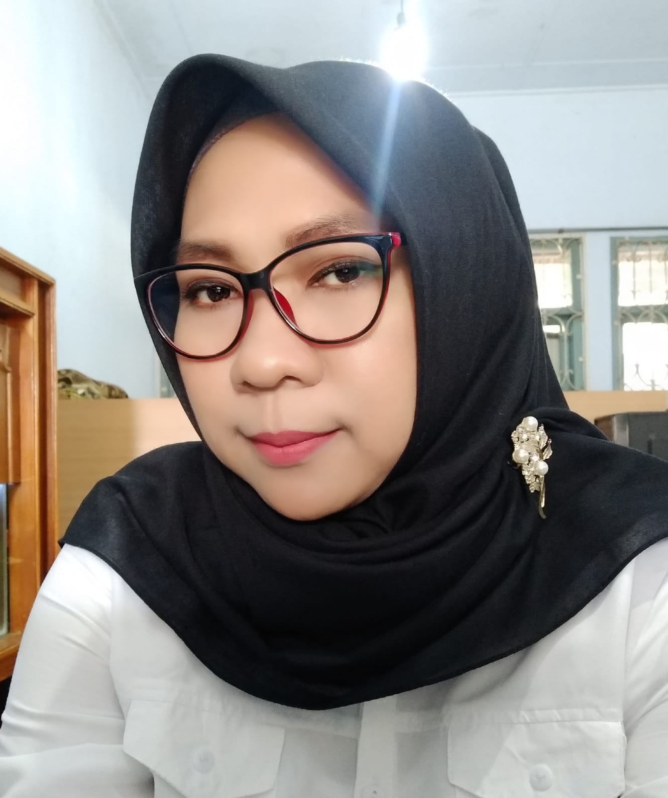 YULI HERLIANI, S.I.Pust.